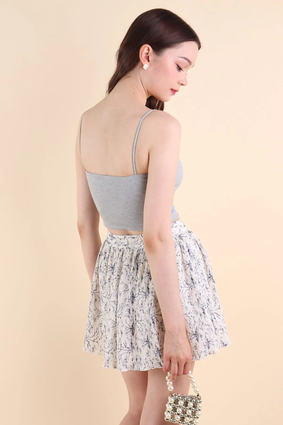 FREESIA FLORAL PLEATED SKORTS IN PORCELAIN